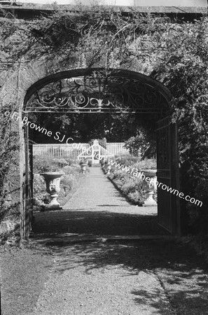 DUNSANY CASTLE GARDEN THROUGH GATE WITH VICTORIA DE RUTZEN AND 